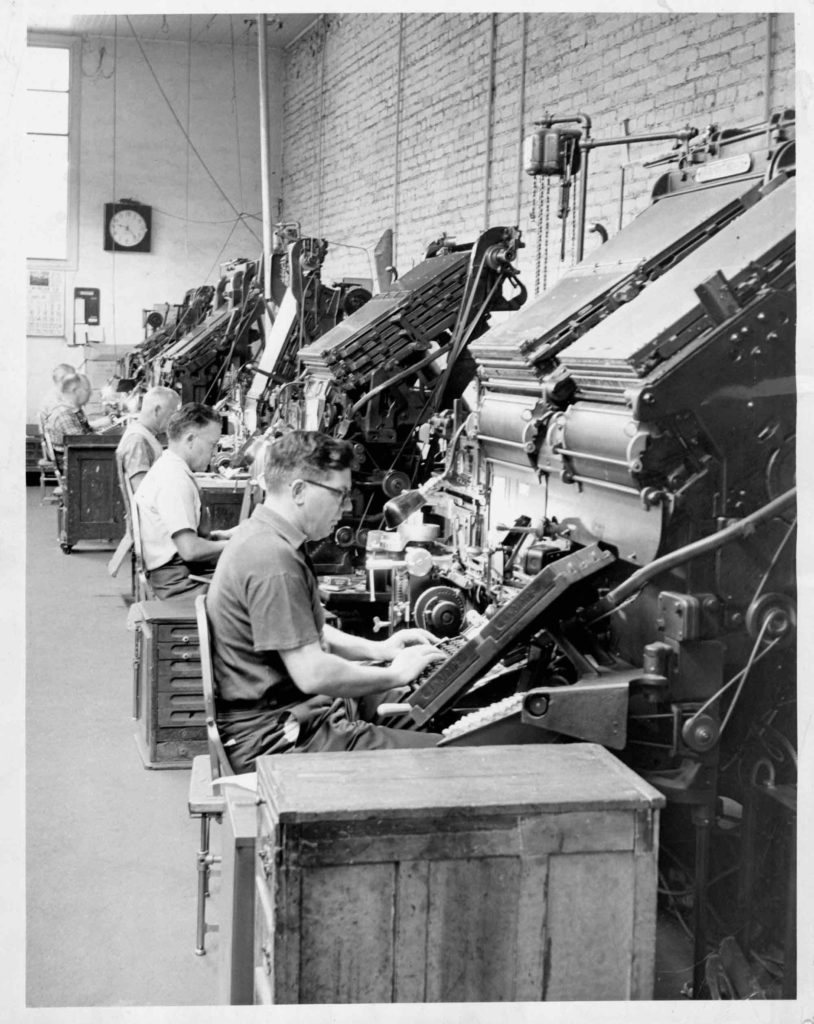 news stories being set Ed Mannion foreground